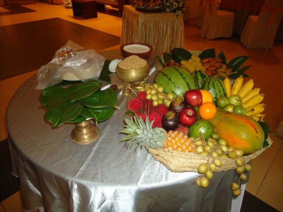 Kiribath table with fruit basket and betel leaves