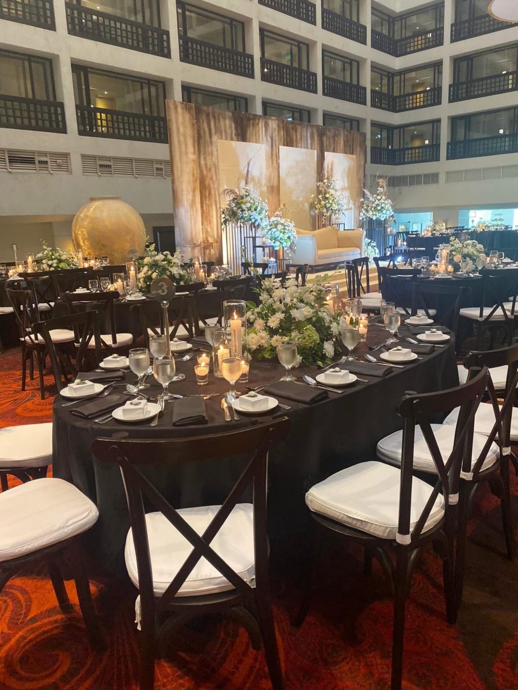 Reception tables with gold centrepieces